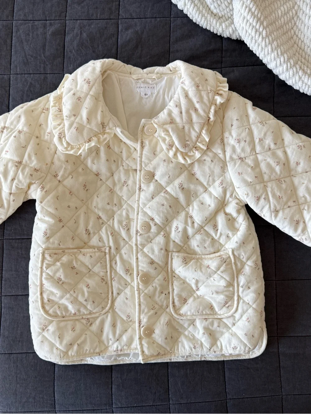 Jamie Kay Kids Quilted Cream Jacket with Ruffle Collar